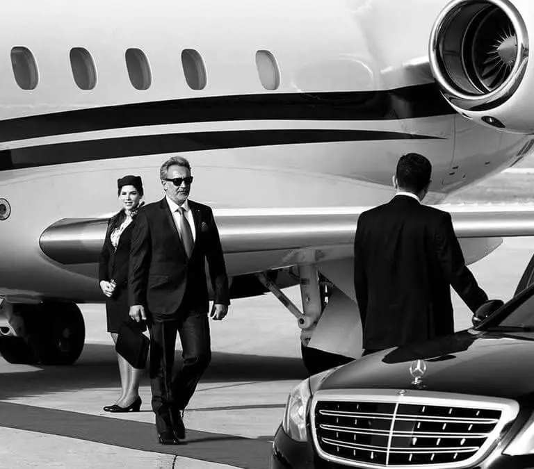 Luxury private airport transfer black car and SUV from Supreme Limo in Vancouver International Airport terminal (YVR).